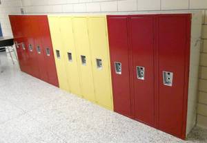 lot 400 image: by 102 - Clean, 12 Red and Yellow lockers 12 inches wide 48 tall