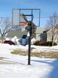 lot 277 image: Outdoor adjustable height basketball hoop - Needs new glass or acrylic for the backboard