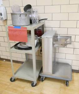 lot 100 image: K - Atlas mobile cantilever rack tray dispenser and cart with contents