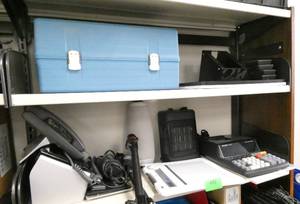 lot 492 image: Rm 102 - 2 Shelves with a calculator, heater, bluetooth speaker, phone, tablet and more