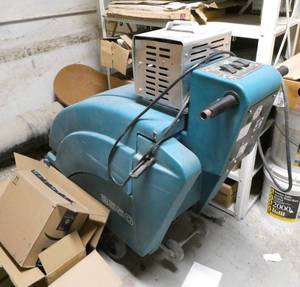 Custodian - Tennant 2550 floor scrubber with charger