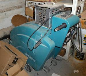 Custodian - Tennant 2550 floor scrubber with charger