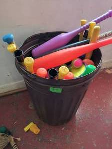 lot 269 image: GymS- garbage barrel full of plastic baseball bats