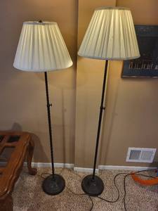 lot 200 image: Pair of Black Metal Floor Lamps with Pleated Shades