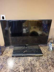 lot 228 image: Samsung Flat-Screen TV with Toshiba DVD Player and Remotes
