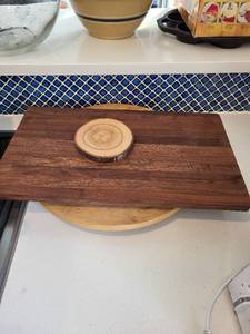 lot 305 image: Kohler Walnut Cutting Board and Wooden Lazy Susan with Wood Slice Trivets