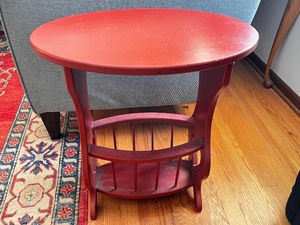 lot 8 image: Red Oval Side Table with Magazine Rack, 22 Inch Tall