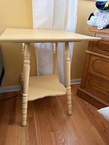 lot 146 image: Butter Yellow Cream-Painted Twisted-Leg End Table with Lower Shelf