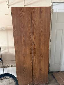 lot 404 image: Tall Wood-Grain Cabinet with Double Doors - Shelved Interior
