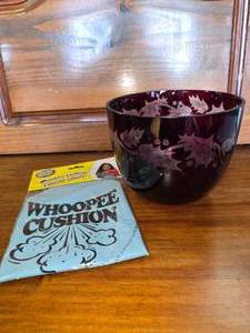 lot 21 image: Red bowl and whoopie cushion