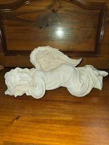 lot 90 image: Mantel Angel facing left