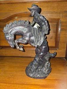 lot 98 image: Bronze cowboy on the horse