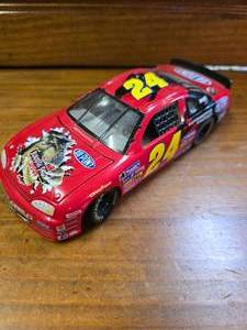 lot 143 image: Jeff Gordon 124 1997 Jurassic Park The Ride