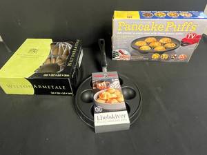 lot 9 image: Collection of Pancake Puff Pans Including Wilton Armetale, Nordic Ware Ebelskiver, and Pancake Puffs