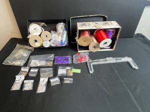 lot 14 image: Assorted Jewelry Making Supplies with Leather Connectors, Clasps, and Cord Spools
