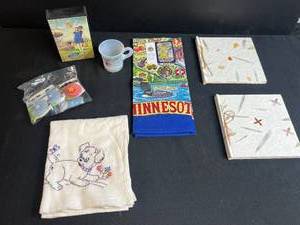 lot 23 image: Vintage Souvenir Assortment with Minnesota Tea Towel, Minnesota Cup, Art Box, and Wine Stoppers