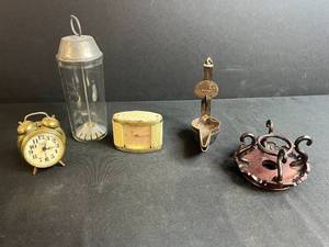 lot 26 image: Collection of Vintage Table Clocks, Open Pan Oil Lamps, Glass Mixer, and Carved Wooden Stand