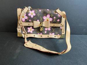 lot 43 image: Louis Vuitton Cherry Blossom Monogram Shoulder Bag with Studs, Lock, Bow and Bag - no date or serial number