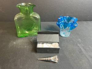 lot 53 image: Blenko Handcrafted Green Glass Vase, Blue Art Glass Vase, and Crystal Bottle Stopper Set