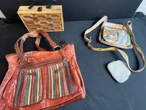 lot 71 image: Collection of 4 Vintage and Designer Purses Including Anuschka, The Sak, and Wooden Handbag
