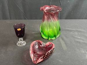 lot 128 image: Art Glass Collection with Fostoria Goblet, Pink-Green Vase, and Heart Paperweight