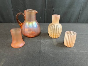 lot 135 image: Fenton Cameo Opalescent Rib Optic Glass Pitcher and Tumbler and Iridescent Peach Satin Glass Pitcher and Tumbler