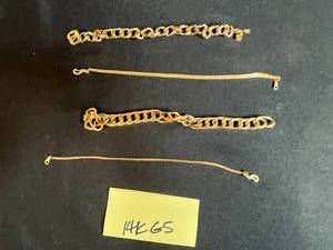 lot 151 image: Collection of 4 14K GS Gold Tone Chain Link and Snake Chain Bracelets