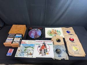 lot 84 image: Vintage Vinyl Records, Cassette Tapes, and Wood Case Music Collection