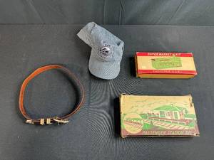 lot 90 image: Railroad Memorabilia Collection with Conductor Cap, Plasticville Kits, and Belt