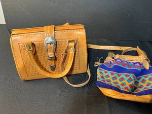 lot 196 image: Force Ten West Leather Handbag and Multicolor Woven Drawstring Purse