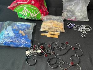 lot 258 image: Assorted Clothespins, Carabiner Hooks, Curtain Hooks, Metal Wall Decor, and Bungee Cords