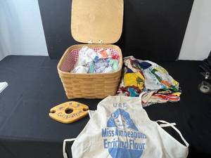 lot 261 image: Vintage Handkerchief and Linen Collection with Basket, Flour Sack Apron, and Wooden Wine Holder