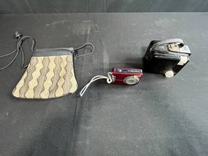 lot 299 image: Canon PowerShot A480 and Kodak Brownie Hawkeye Cameras with Textile Pouch