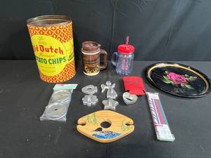lot 307 image: Vintage Old Dutch Potato Chip Tin (no lid), Tray, Cookie Cutters, Tumblers, and Kitchen Accessories Assortment