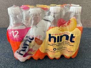 lot 115 image: 12 Bottles Of Hint Peach Raspberry