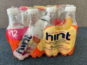 lot 116 image: 12 Bottles Of Hint Peach Raspberry