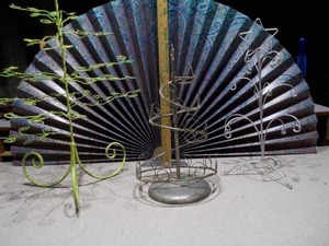 lot 24 image: These are various metal wire ornament or jewelry display stands,