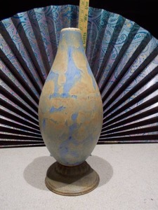 lot 45 image: This is a handmade porcelain vase with a blue and rust crystalline glaze