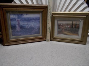 lot 55 image: The image displays two framed art prints