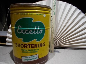 lot 77 image: This is a vintage 50-pound Excello shortening tin can