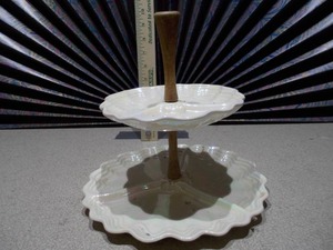 lot 121 image: This is a vintage two-tiered server, possibly from Maddux of California