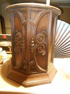 lot 158 image: The item in the image is the BASE of an octagonal (or hexagonal) curio cabinet