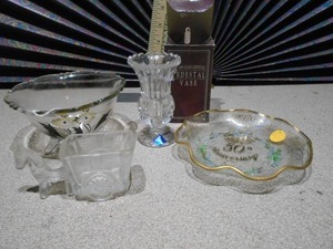 lot 175 image: This image displays a collection of glass items,