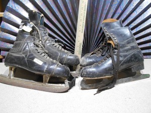 lot 181 image: These are vintage black leather ice skates