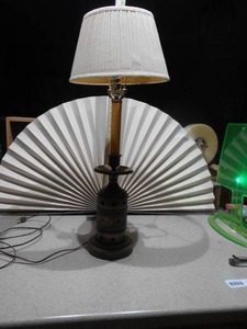 lot 188 image: This is an antique wooden wagon wheel hub table lamp