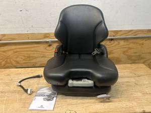 lot 81 image: BIG DOGHUSTLER MECH SEAT VIN, Model# Grammer MSG65531 MSRP $869.99