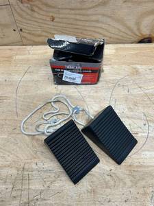 lot 157 image: Ironton Compact Wheel Chocks, 4-516in.L x 3in.W x 2-58in.H, Solid Rubber, 2-Pk.