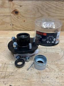 lot 175 image: Ultra-Tow XTP Ultra-Pack Trailer Hub, 5 on 4-12in. 1750-Lb. Capacity (broken bearing)