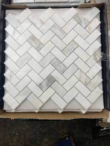 lot 19 image: MSI Arabescato Vendalo White Herringbone Marble Tile Mosaic - 2 Boxes