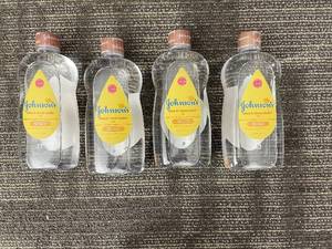 lot 468 image: Johnsons Shea & Cocoa Butter Oil - 20 fl oz - 4 Bottles